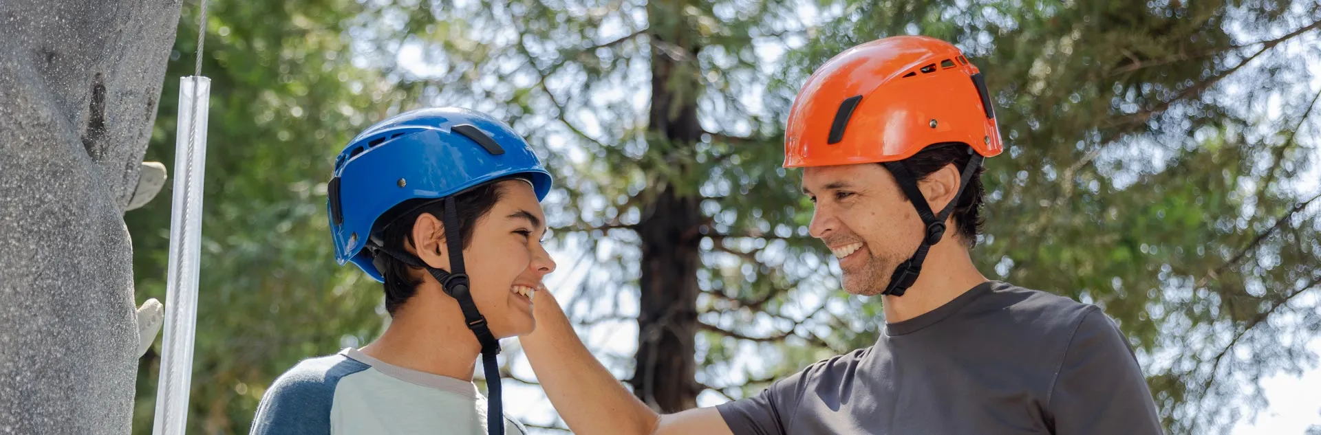 A Tenaya guest and an instructor prepare to tackle the climbing wall