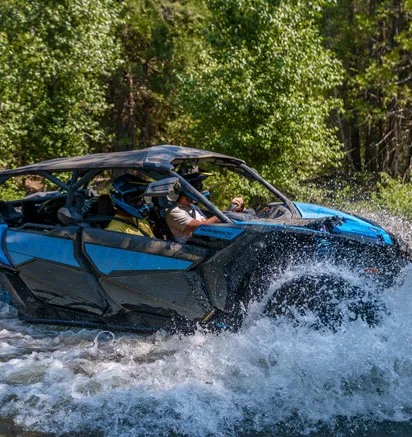 Yosemite Adventure Company car driving through water