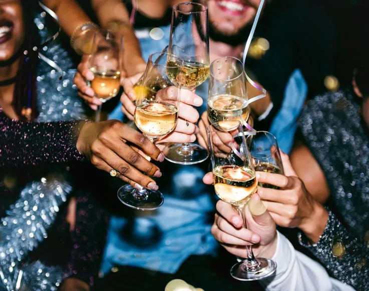 A group of guests toasting champagne glasses