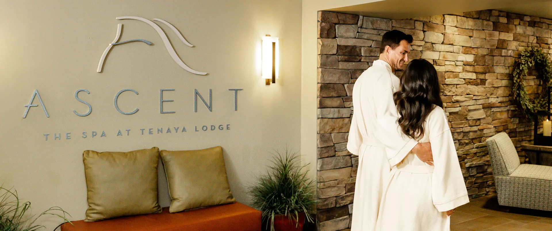A couple walking into the Ascent Spa