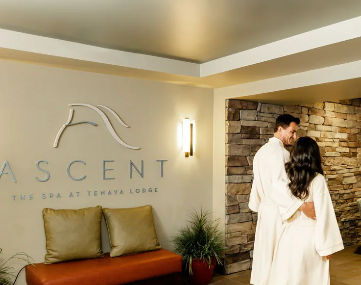 A couple walking into the Ascent Spa