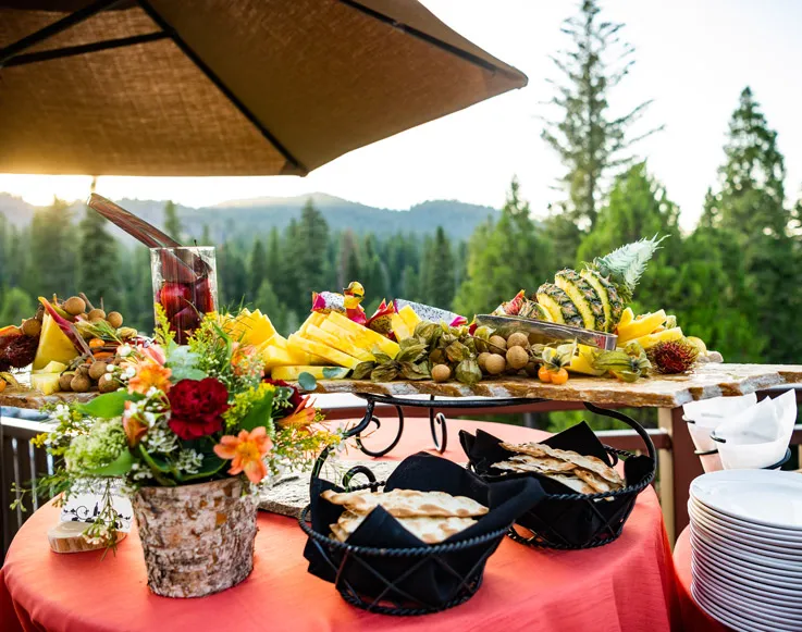 A delicious spread of fresh fruit with an outstanding view