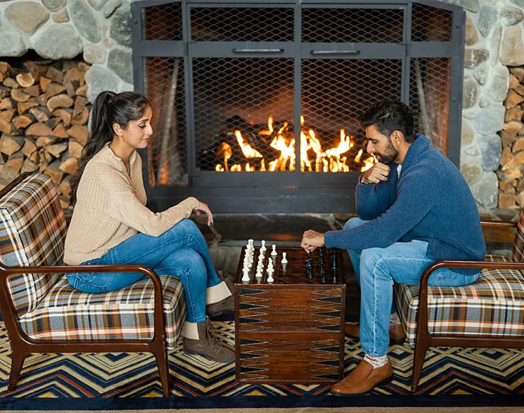 Upcoming Events 5 A couple enjoying a game of chess at Tenaya at Yosemite