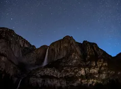 A starry night sky over Yosemite Valley