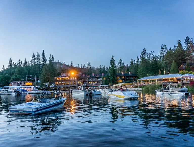 Discover Hidden Gems Beyond Yosemite 6 Boats out on the water at Bass Lake