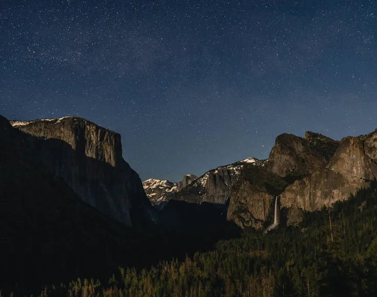 Spring Itinerary 3 A starry night sky over Yosemite Valley