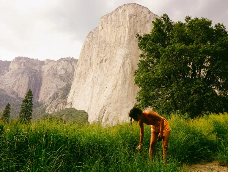 One Day w Pass 3 A Yosemite visitor exploring the meadow below El Capitan