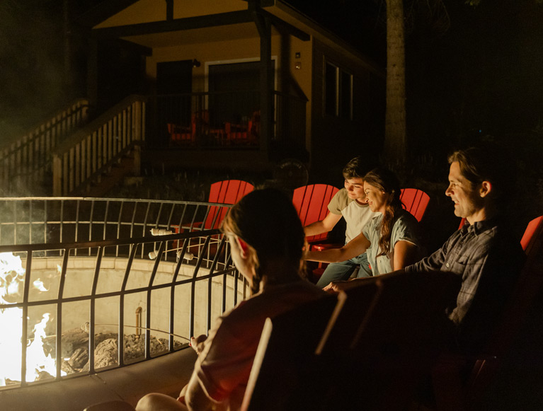 Specials / Packages 2 A family enjoying the outdoor fire at Tenaya at Yosemite