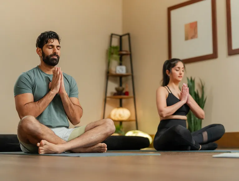 Specials / Packages 2 A couple doing yoga at Tenaya at Yosemite