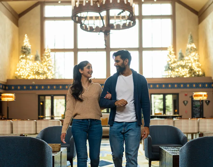 Two guests in the lobby of Tenaya at Yosemite