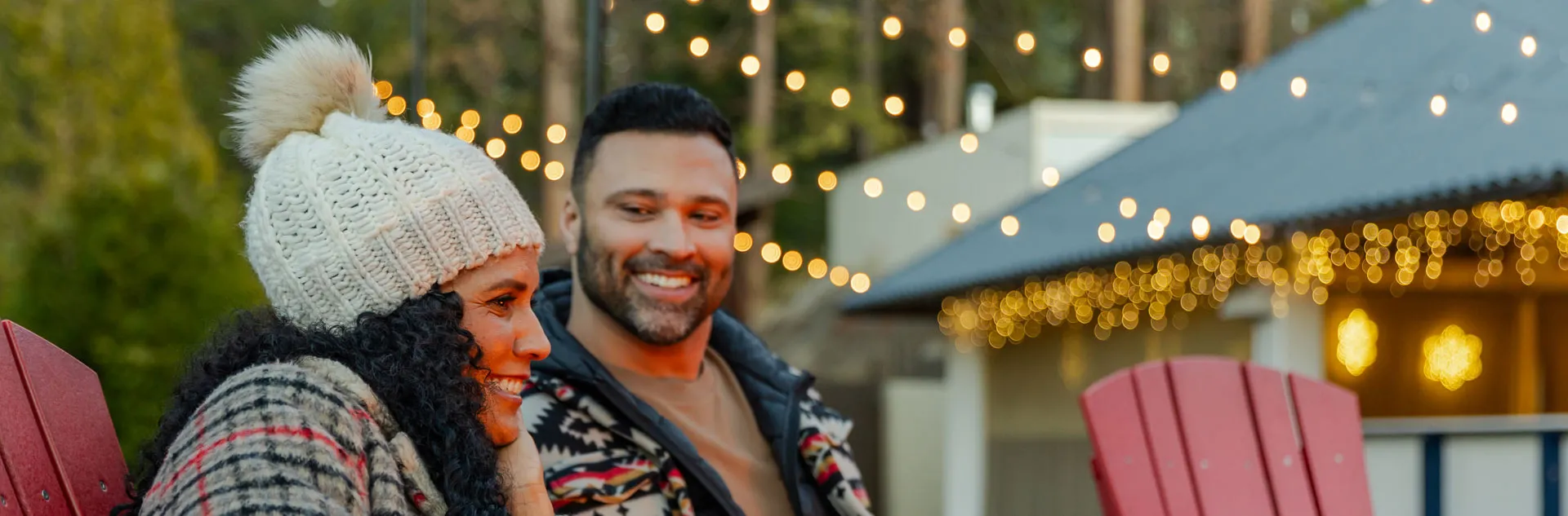 One Day Winter 1 Two guests enjoying drinks by the outdoor fire at Tenaya at Yosemite