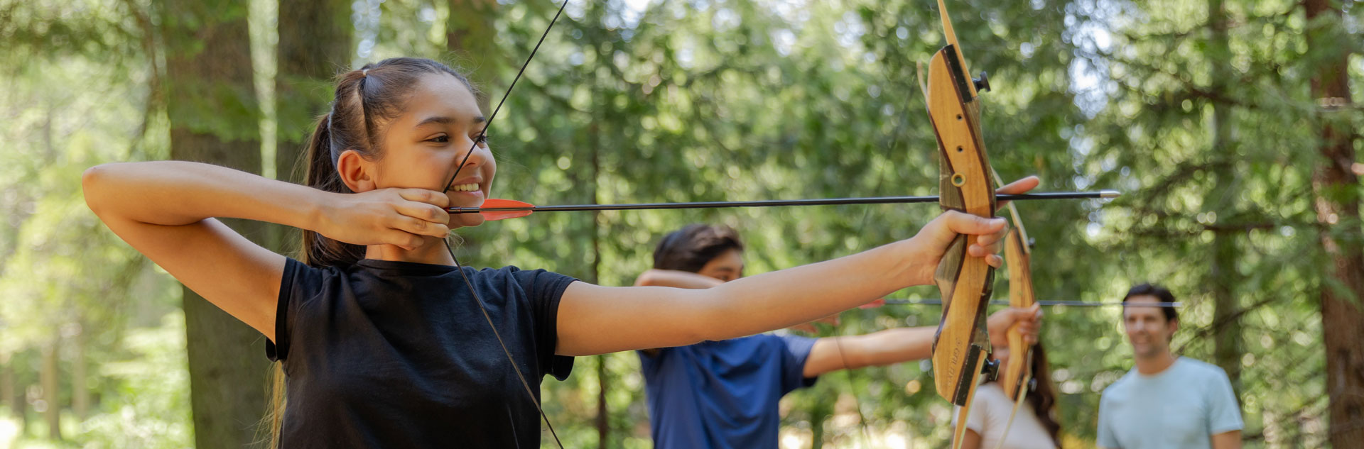 Archery Lessons 1 A family practicing archery at Tenaya at Yosemite