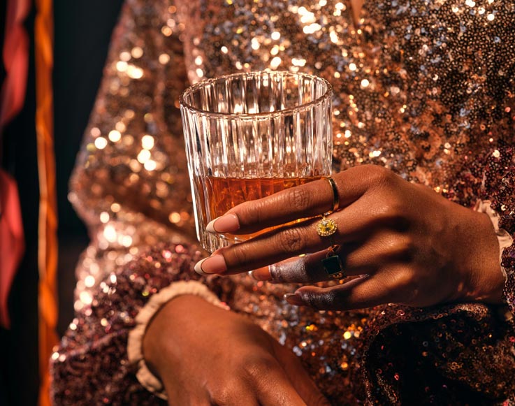 New Year’s Eve Celebration 2 A guest holding a cocktail at New Year's Eve