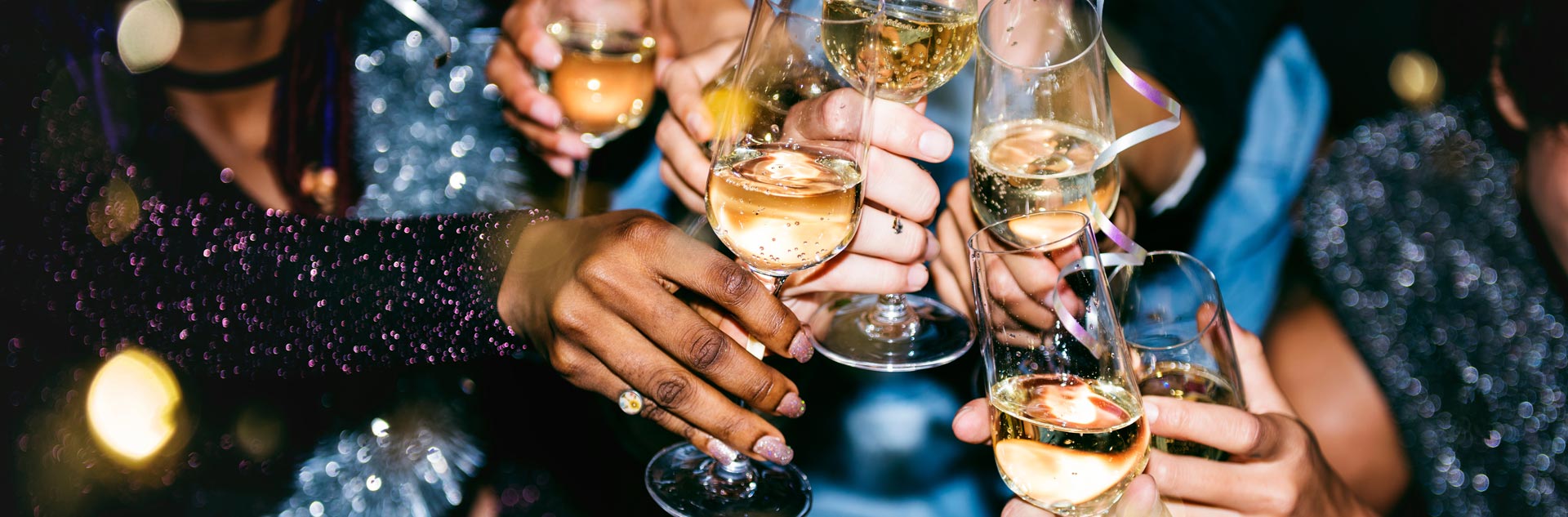 New Year’s Eve Celebration 1 A group of guests toasting champagne glasses on New Year's Eve