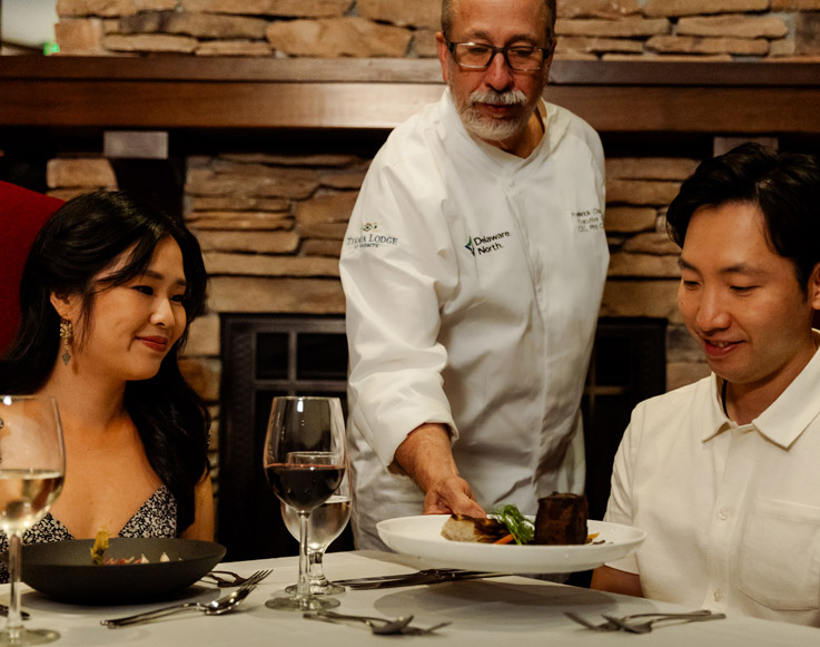 Dining 5 A couple being served at Embers Restaurant at Tenaya at Yosemite