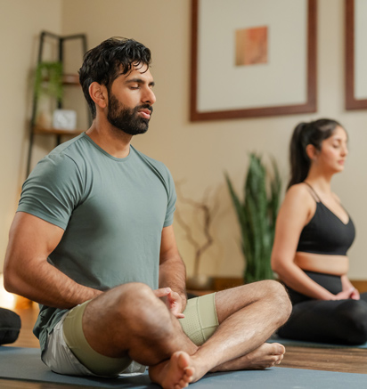 A couple taking a yoga class at Tenaya at Yosemite