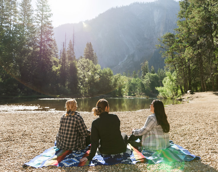 A group of girls enjoying a view of Yosemite National Park