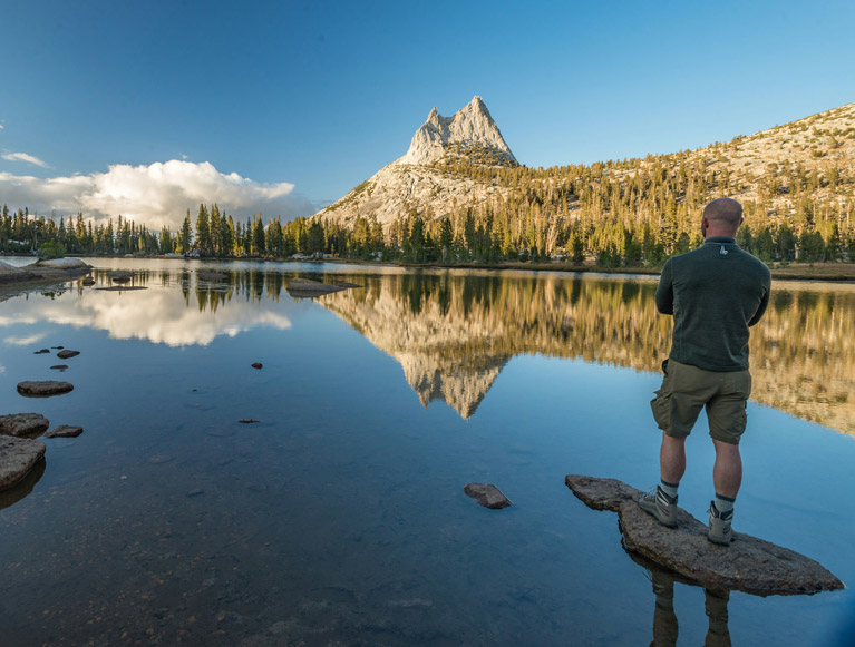 A summer hiker at Cathedral Lakes in Yosemite National Park