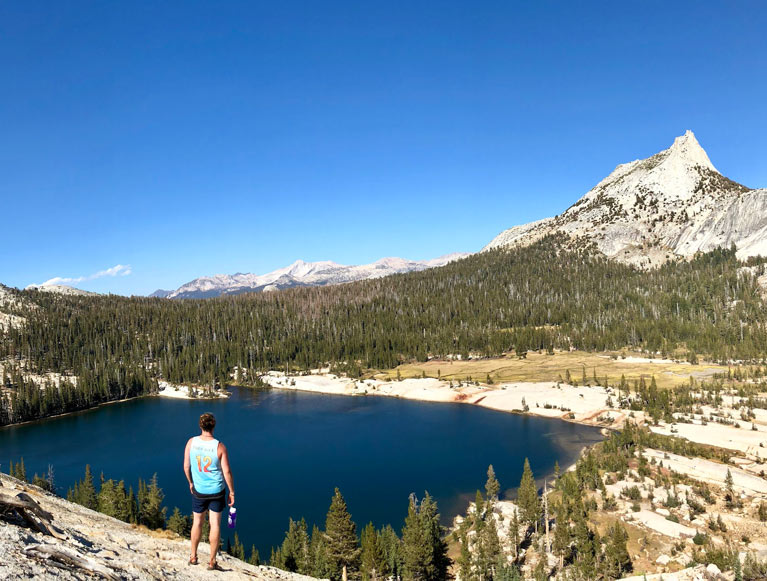 A hiker at Cathedral Lakes in Yosemite National Park