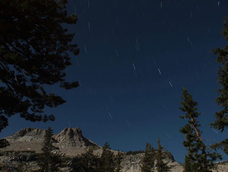 A starry night sky over Yosemite National Park