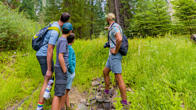A family on a nature hike at Tenaya at Yosemite