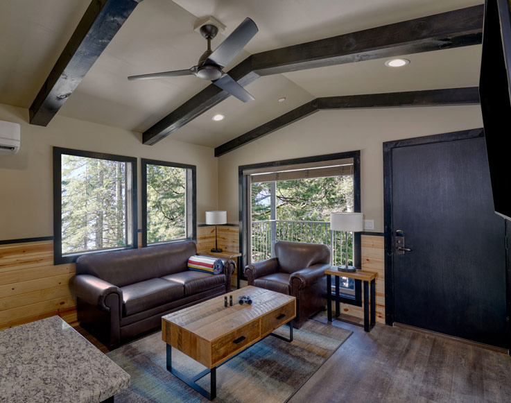 Accommodations 6 The living room of an Explorer Cabin at Yosemite