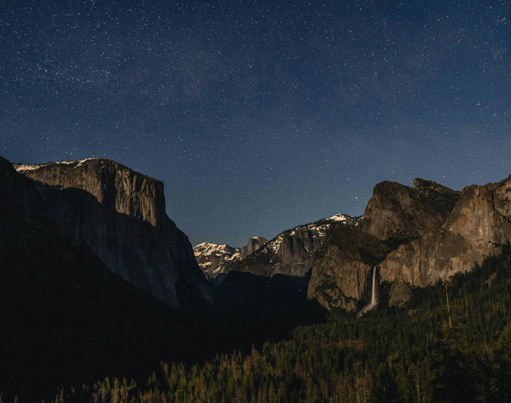 A starry night sky over Yosemite Valley