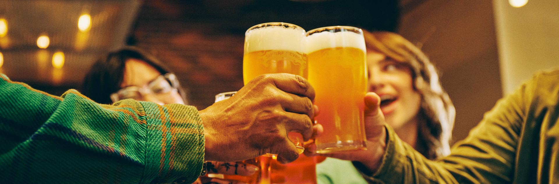Guests cheering beers at Tenaya at Yosemite