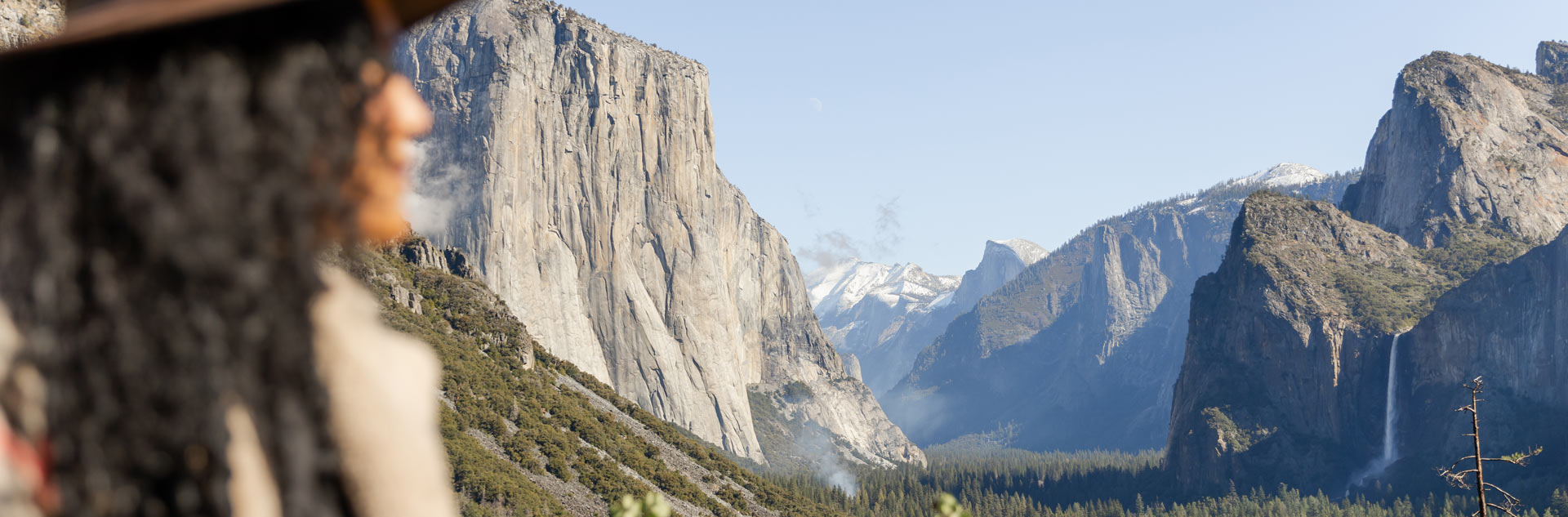 A visitor enjoying a view of Yosemite Valley