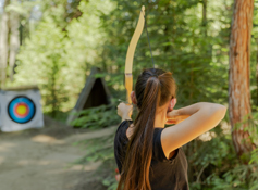 A guest practicing archery at Tenaya at Yosemite