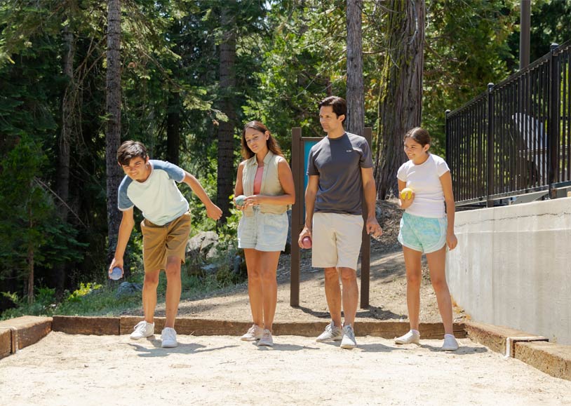 Home 6 A family playing bocce ball at Tenaya at Yosemite