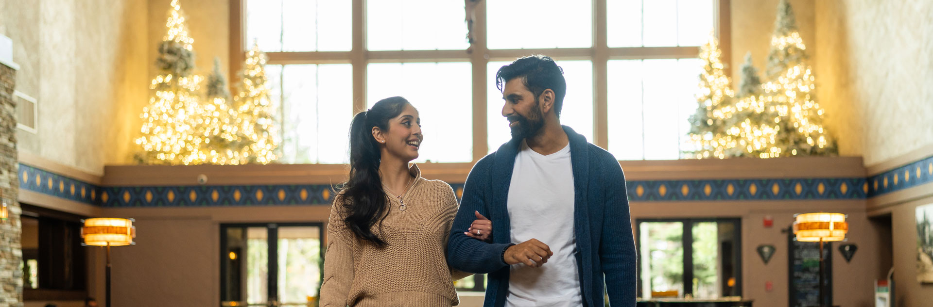 Two guests in the lobby of Tenaya at Yosemite