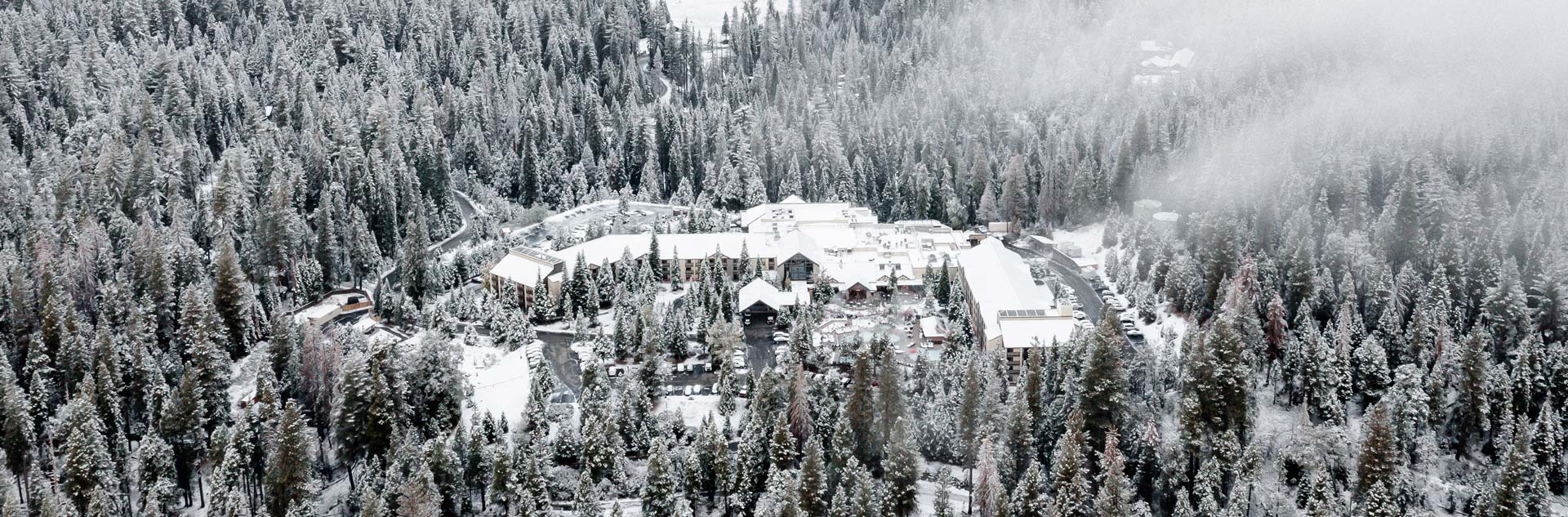 Accommodations 1 An aerial view of Tenaya at Yosemite during winter