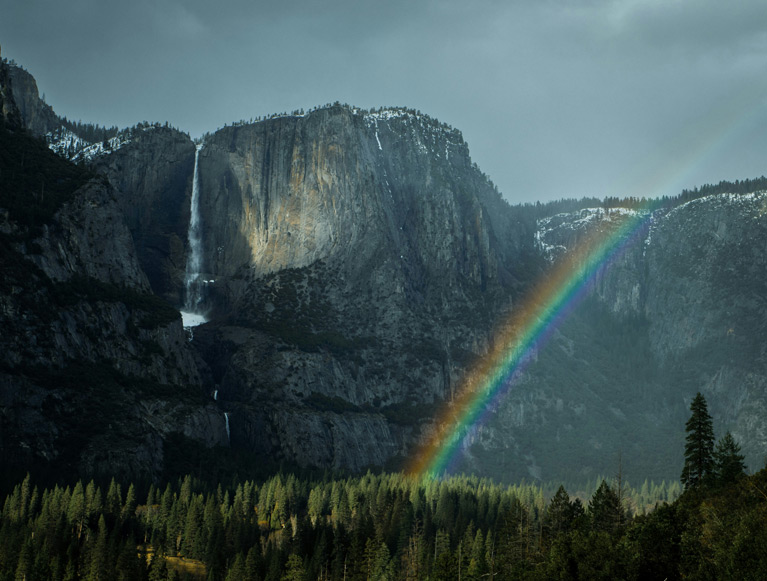 Yosemite Falls and a rainbow in Yosemite Valley