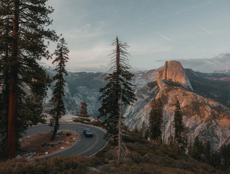 A car on the road to Glacier Point in Yosemite National Park