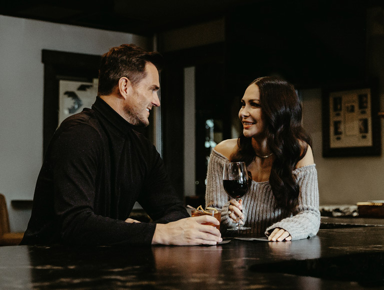 Two Tenaya at Yosemite guests enjoying a glass of wine