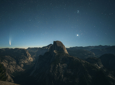 A starry night sky over Half Dome in Yosemite National Park